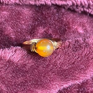 Elegant Gold Wire Wrapped Ring with Orange Gemstone